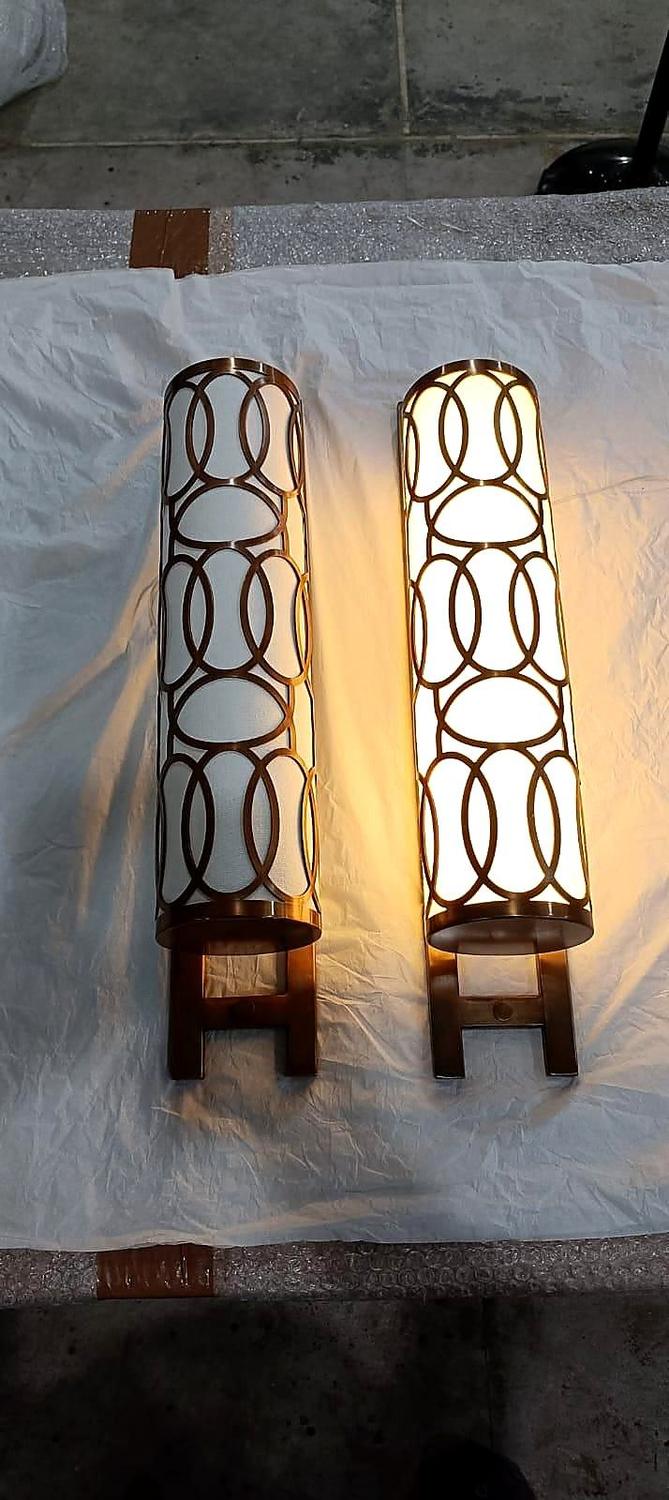 Signature sconce · lit
